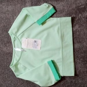 Fabletics NWT Avah Color Block Cut off Sleeve Crop Aloe and Tropical Water